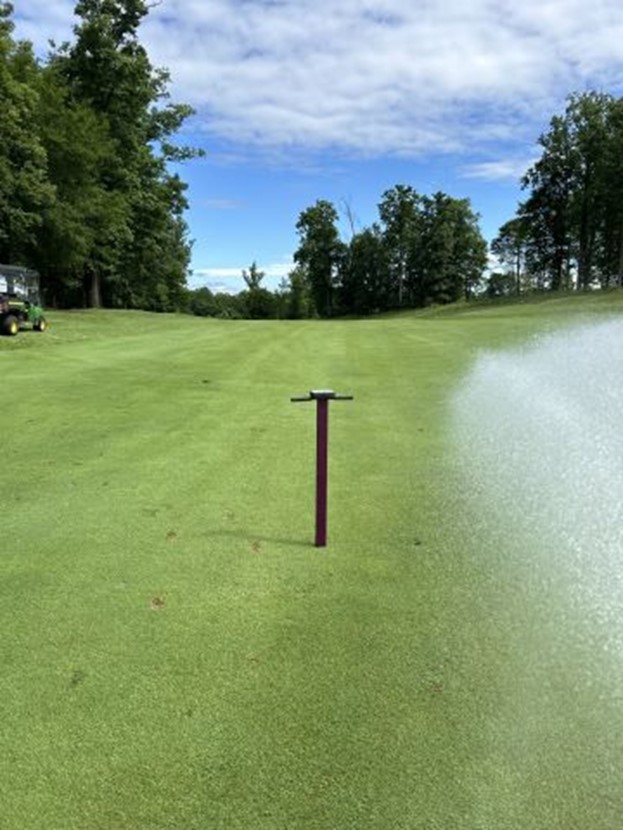 a moisture meter on the course